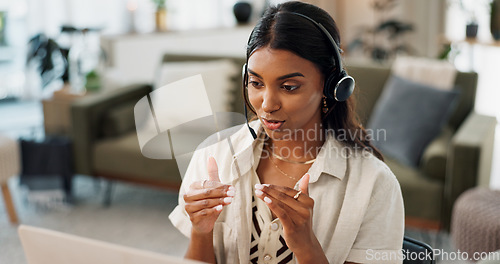 Image of Woman, call center and headphones consulting in remote work, customer service or telemarketing at home office. Female person or consultant agent talking, explaining or online advice for help at house