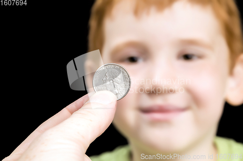 Image of the coin is a quarter of an American dollar