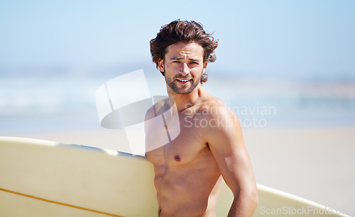 Image of Beach portrait, surfing and fitness man on sports holiday, vacation or getaway for nature wellness, sea break or hobby. Surfboard, activity and surfer on tropical island paradise, coast or shore