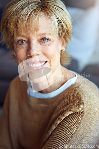 Image of Portrait, mature or happy woman in apartment to relax with freedom on living room sofa or couch. Home, face or senior lady with smile, peace or wellness in retirement or house for a resting break