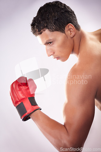 Image of Man, fighter or gloves white background for boxing strength, sports training or active martial arts. Male person, shirtless or punch arm fist performance for competition, commitment or mma in studio