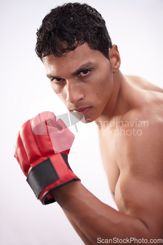 Image of Man, portrait or boxer white background as fighter strength, sports training or active martial arts. Male person, shirtless or punch arm fist performance for competition, boxing or mma in studio