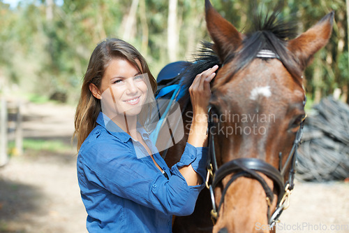 Image of Woman, portrait and horse, animal and equestrian with riding outdoor, countryside and ranch. Sports, recreation and farm with young rider, stable and jockey with mare or pet, training for rodeo