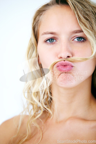 Image of Woman, portrait and hair mustache for fun mood, scold finger or funny personality. Female person, face and humor kiss on white studio background for confident playful attitude, point or comedy joke