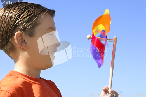 Image of Boy with a spinning wheel pinwheel