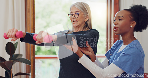 Image of Physical therapy, exercise and senior woman with dumbbell, weightlifting and training arms and muscle. Strong, fitness and old person with nurse or physiotherapist to help in rehabilitation workout