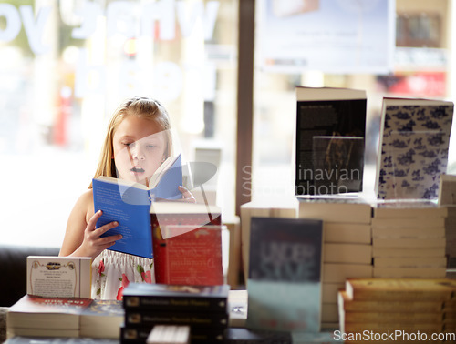 Image of Reading, books and child in bookshop with shock, learning and surprise with knowledge in shop. Storytelling, girl in bookstore with story, fantasy novel stack and education with imagination in store
