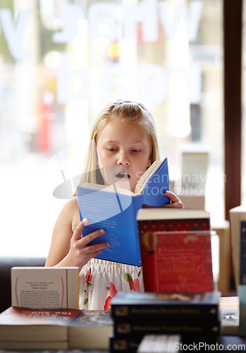 Image of Shock, stack of books and child in bookshop, learning and studying, homework and knowledge in store. School, surprise face and girl in bookstore with story, fantasy and education in shop reading.