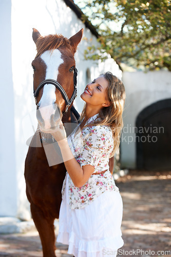 Image of Happy, love and young woman with her horse on an outdoor farm for sports racing at ranch. Smile, training and confident female person from Canada with her equestrian animal or pet in countryside.