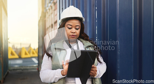 Image of Logistics, business and black woman shipping containers being check or inspect cargo for transport. Female boss or worker with tablet confirm import, export or shipment for international supply chain