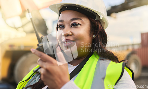 Image of Engineer, black woman and walkie talkie for control management and communication with hardhat on inspector, manager or foreman on construction site. Female worker at logistics shipping yard in Africa