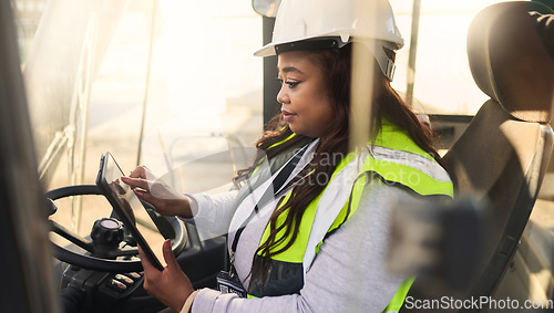 Image of Logistics, tablet and black woman in crane in shipping plant, manufacturing supply chain or ecommerce delivery warehouse. Thinking industrial manager, engineering worker and leader with 5g technology