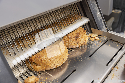 Image of Bread slicing machine.