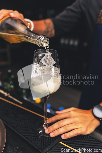 Image of Barman is preparing a cocktail