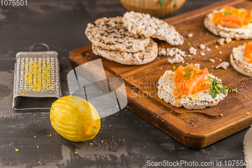 Image of Smoked salmon on rice bread toasts