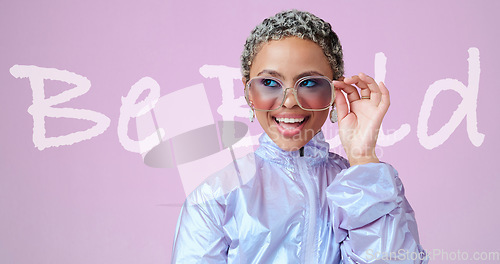 Image of Stylish, bold and holographic fashion female with sunglasses and futuristic vaporwave clothing, excited and happy against a pink mockup background. Black woman model looking cool in a metallic jacket