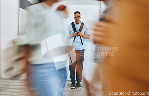 Image of Bullying, depression and sad university student, black man and mental health problems in busy college. Social anxiety, depressed and lonely campus guy, loser and victim fail in school youth education