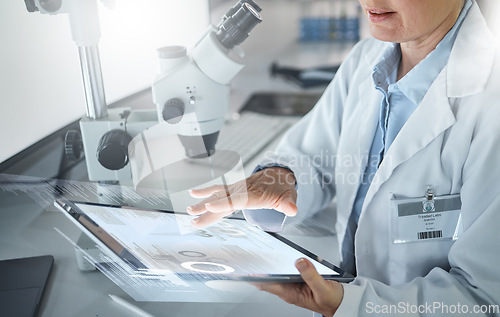 Image of Science, future and tablet, woman in laboratory doing research in hospital in Switzerland. Technology, medical innovation and a university lab worker or scientist looking at information online.