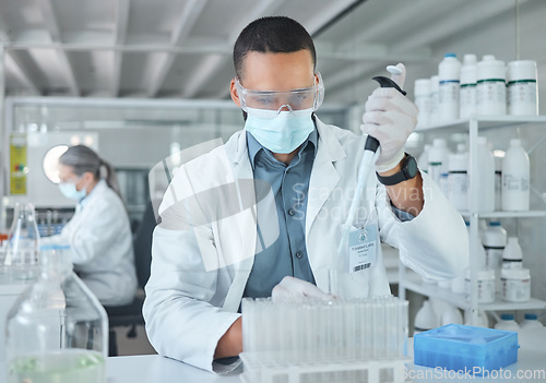 Image of Covid lab, medical science or man scientist working on futuristic medicine research for healthcare at a laboratory. Doctor, nurse or chemical test on liquid for innovation, vaccine or DNA in hospital