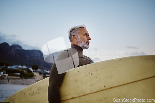 Image of Surfer, beach and old man with surfboard to start surfing with freedom and ocean waves in Brazil outdoors. Sports, tourist and senior person in retirement looking at sea water on holiday vacation