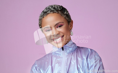 Image of Smile, black woman and fashion influencer with in portrait with makeup in a pink studio background with mockup. Happy, beauty and happy girl smiling with a cool, trendy and modern jacket in Paris