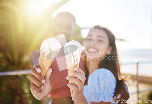 Image of Ice cream, hands and women friends in city, outdoors or town having fun spending summer vacation time together. Diversity, love and lesbian couple or girls hug while eating gelato on date or walk.
