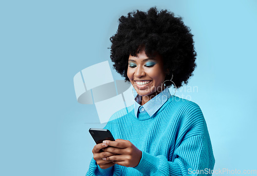 Image of Mockup, smile and black woman with phone typing a online communication message to a contact using social media app. Retro, vintage and happy girl with afro hair doing a internet, web or online search