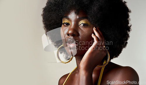 Image of Fashion, face makeup and creative black woman with designer power against a mockup studio background. Portrait of an African model with cosmetic art for empowerment and beauty with mock up space