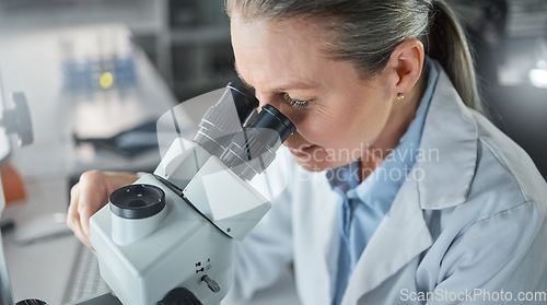 Image of Science, research and microscope with a woman engineer working in her laboratory on innovation and development. Analytics, future and sample with a scientist at work with DNA or RNA in her lab