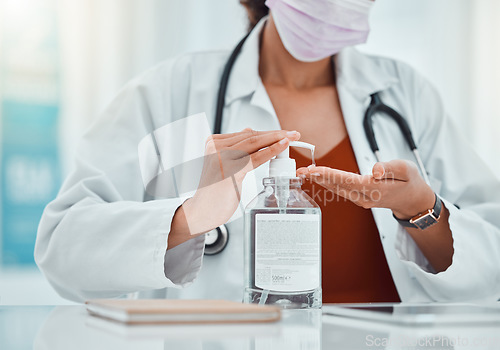 Image of Covid, hand sanitizer and doctor woman in hospital office for hand cleaning healthcare safety, risk management and compliance. Covid 19, corona virus and healthcare worker with liquid bottle product