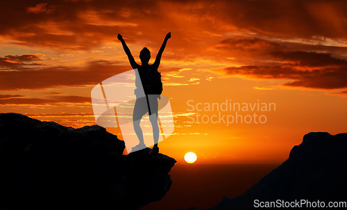 Image of Freedom, mountain and man silhouette hiking at sunset, happy and success celebration in nature. Motivation, health, and energy by a backpacker shadow after adventure and trekking expedition with joy