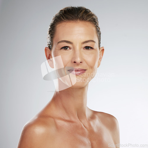 Image of Senior woman with botox, portrait of skincare dermatology beauty and cosmetics spa portrait in Portugal. Happy confident lady, sunscreen wellness with microblading eyebrow makeup and gray background