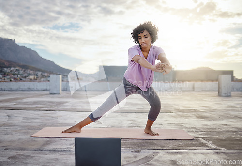 Image of Yoga, stretching and woman on laptop on rooftop streaming training video, web yoga class or tutorial. Health, zen and female from India on tech pc, pilates or exercise, fitness and wellness workout.