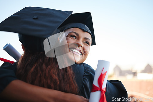 Image of Success, graduation and friends hug at event in celebration of education achievement. Congratulations, smile and happy students embrace, sharing optimistic moment of friendship at graduate ceremony