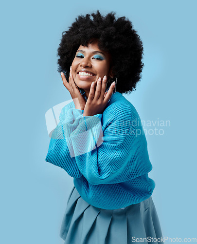 Image of African beauty, makeup and portrait of a black woman with blue eyes shadow, face cosmetics and afro hair or good skin. Funk, smile and young happy girl with vintage, retro and creative fashion style.