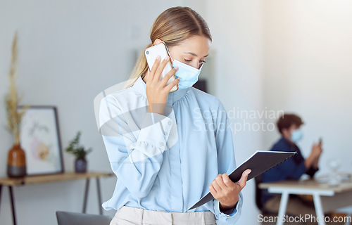 Image of Woman, covid face mask or business phone call in marketing office, advertising startup or creative company. Worker or virus compliance employee with paper research documents for mobile b2b sales deal
