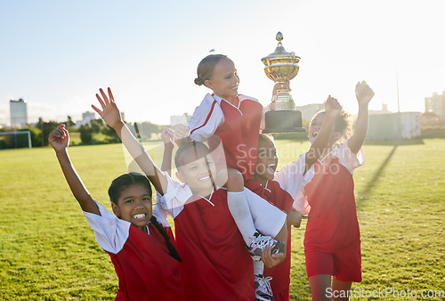 Image of Sports. soccer and young girls with trophy celebrate, happy and excited outside on field for their victory. Team, players and female children are victorious, winners and champions for their game.