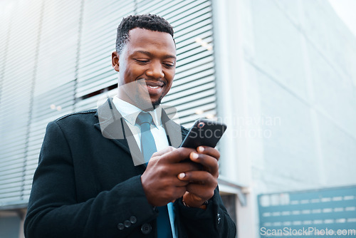 Image of Phone, happy black man and business in city, street or outdoors on social media, web browsing or text message. Employee, entrepreneur and male in Nigeria internet surfing or research on 5g mobile app