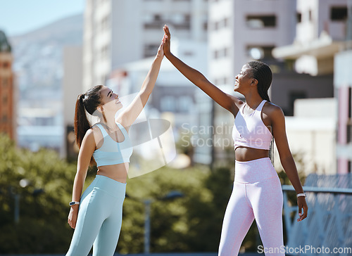 Image of Fitness, women and friends high five after running, training and cardio workout success together outdoors in summer. Winners, sports and happy runners in celebration of health and wellness team goals