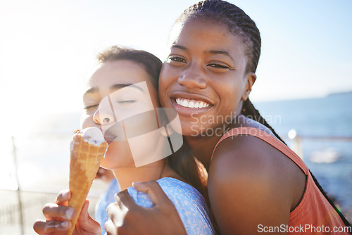 Image of Ice cream, summer and friends on beach in portrait for holiday or outdoor gen z lifestyle with sunshine and mockup. Happy, diversity teenager women or couple smile eating icecream dessert by the sea