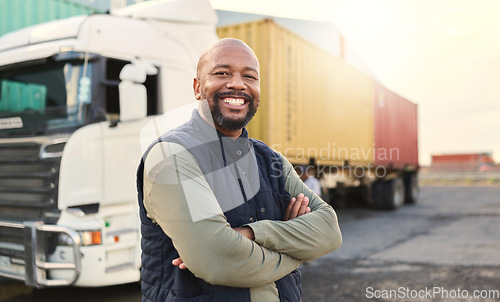 Image of Delivery, container and happy truck driver moving industry cargo and freight at a shipping supply chain or warehouse. Smile, industrial and black man ready to transport ecommerce trade goods or stock