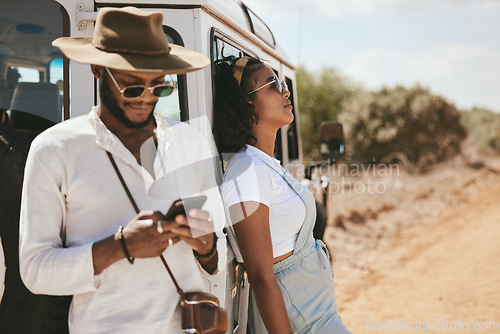 Image of Safari travel, fashion and african couple with car and smartphone for social media update, location check and countryside lifestyle. Influencer black people or youth with summer clothes and transport