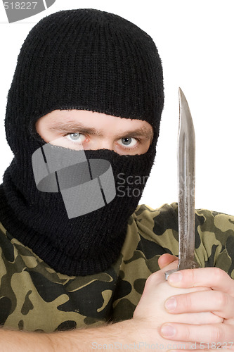 Image of Portrait of the criminal with a knife over white