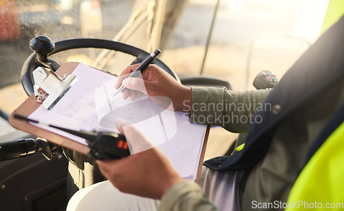 Image of Forklift driver and writing on checklist for warehouse admin and organisation of stock logistics. Professional cargo worker report schedule and management of tasks paperwork for accountability.