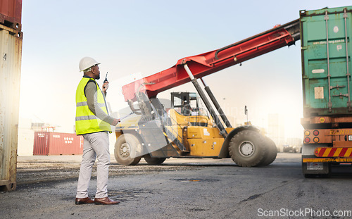 Image of Truck, radio and forklift in logistics of container at port with man for shipping. Worker, talk and control for safety of stock, staff and vehicle in transportation, cargo and supply chain industry