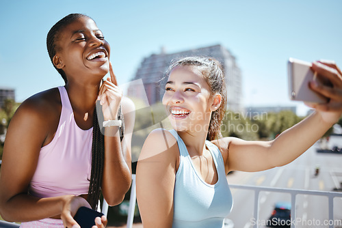 Image of Happy, phone and fitness friends selfie in the city after workout, exercise or training yoga class or pilates. Photo of smile, training or cheerful women bonding, fun and standing in town or miami