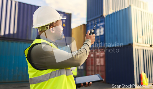 Image of Logistics, supply chain and shipping with a man, tablet and radio to plan delivery and shipment of container. Stock, cargo and freight worker on a commercial dock for export and import distribution