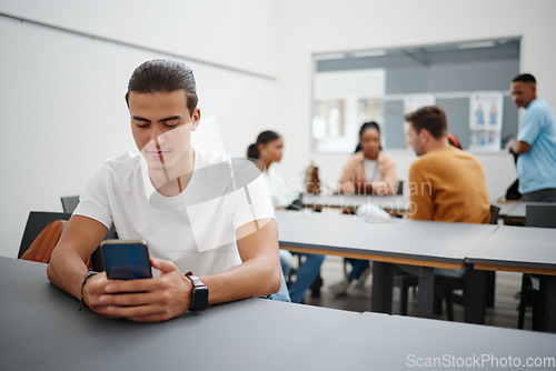 Image of University man and social media on smartphone in lecture auditorium lesson for internet break. Distracted college student busy with phone text communication on online app in education campus.