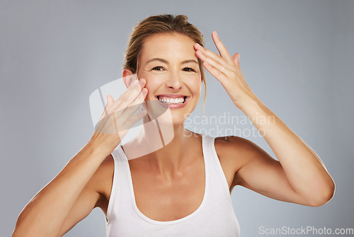 Image of Skincare, beauty and woman with face portrait in studio grey background mockup. Makeup wellness, self love or self care model with happy facial treatment, dermatology or cosmetics mock up advertising