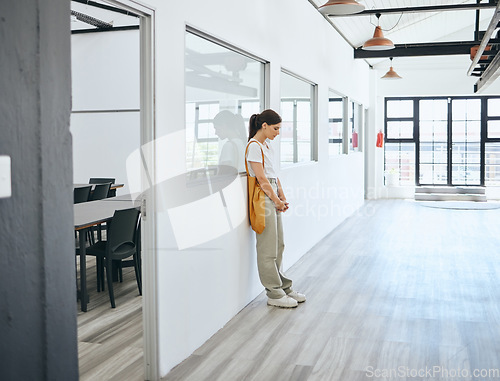 Image of Depression, stress and woman standing in office upset, sad and disappointed after job loss, fired or mental health problem. Female feeling burnout, anxiety and hopeless looking or waiting for job